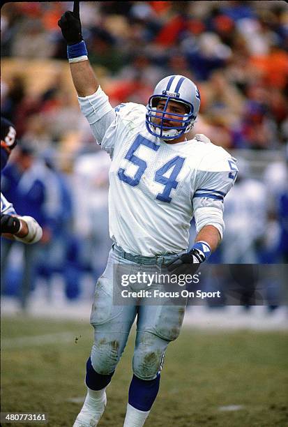 Chris Spielman of the Detroit Lions celebrates after making a play against the Chicago Bears during an NFL football game December 10, 1989 at Soldier...