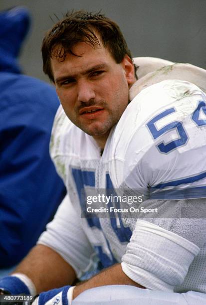 Chris Spielman of the Detroit Lions looks on from the bench against the Chicago Bears during an NFL football game December 10, 1989 at Soldier Field...