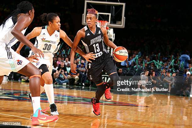 Danielle Robinson of the San Antonio Stars drives against the New York Liberty on July 15, 2015 at Madison Square Garden in New York City, NY. NOTE...