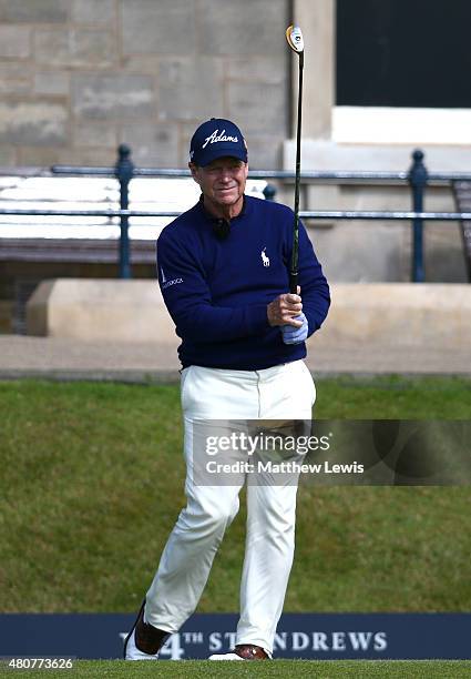 Tom Watson of the United States tees off on the 1st during the Champion Golfers' Challenge ahead of the 144th Open Championship at The Old Course on...