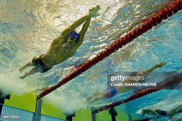 This picture taken with an underwater camera shows Nicolas Oliveira of Brazil and Michael Weiss of the US competing in the Men's 200m freestyle...