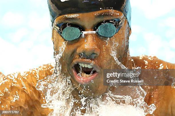 Corey Ollivierre of Grenada swims in the 200 metre breaststroke in the preliminaries of the the second day of the swimming competition at the Toronto...