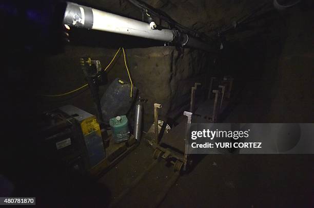 Picture of the two metal carts attached to a motorcycle rigged on a special rail system that were found inside the alleged tunnel through which...