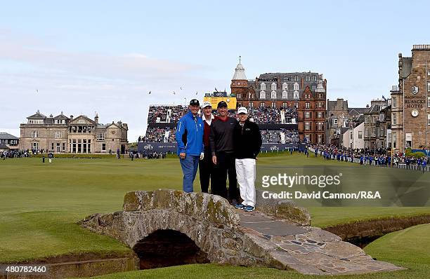 Sandy Lyle, Sir Bob Charles, David Duval and Justin Leonard smile for a photo on Swilcan Bridge during the Champion Golfers' Challenge ahead of the...
