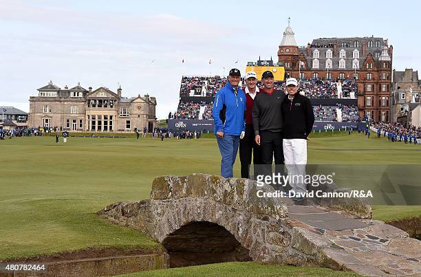 Sandy Lyle, Sir Bob Charles, David Duval and Justin Leonard smile for a photo on Swilcan Bridge during the Champion Golfers' Challenge ahead of the...