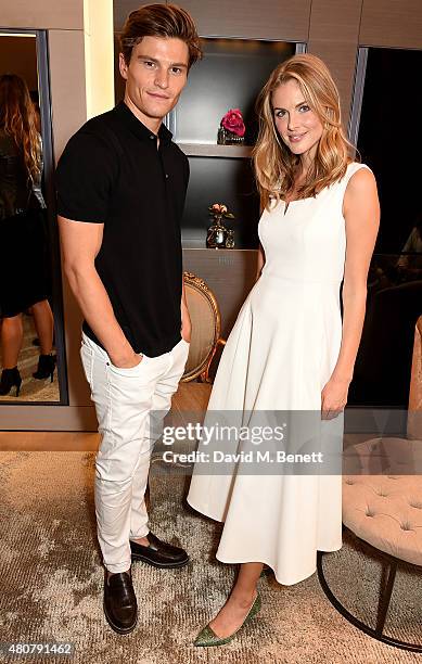 Oliver Cheshire and Donna Air attend Piaget 'Mediterranean Garden' Summer Party on July 15, 2015 in London, England.