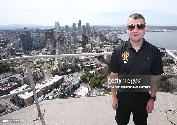 Former player Denis Irwin of Manchester United poses on top of the Space Needle as part of their pre-season tour of the USA on July 15, 2015 in...