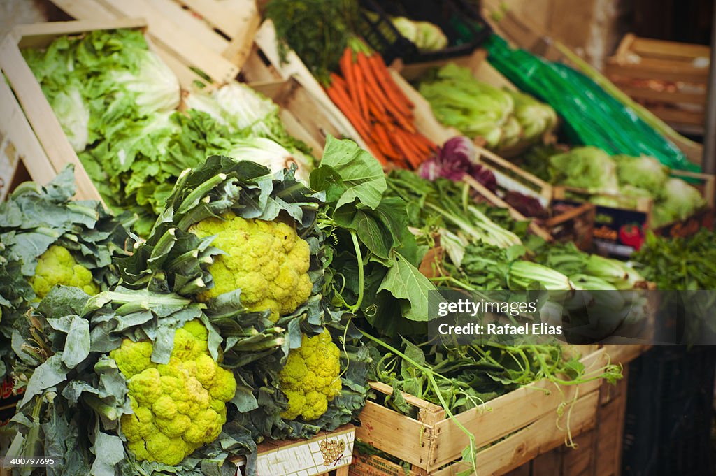 Greengrocer at market