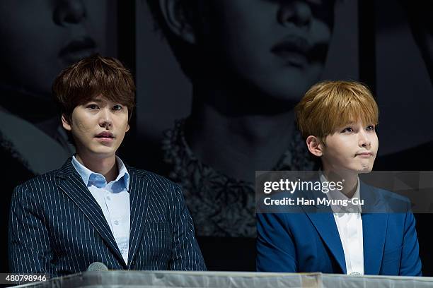 Kyuhyun and Ryeowook of South Korean boy band Super Junior attend the press conference for SM Entertainment's Super Junior 10th Anniversary Special...