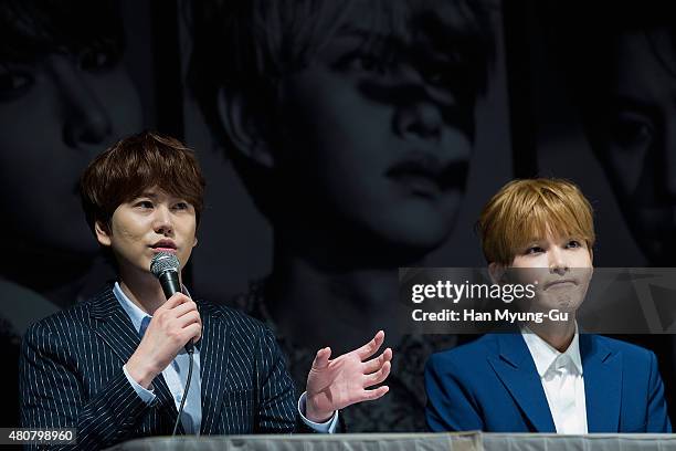 Kyuhyun and Ryeowook of South Korean boy band Super Junior attend the press conference for SM Entertainment's Super Junior 10th Anniversary Special...