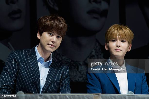 Kyuhyun and Ryeowook of South Korean boy band Super Junior attend the press conference for SM Entertainment's Super Junior 10th Anniversary Special...