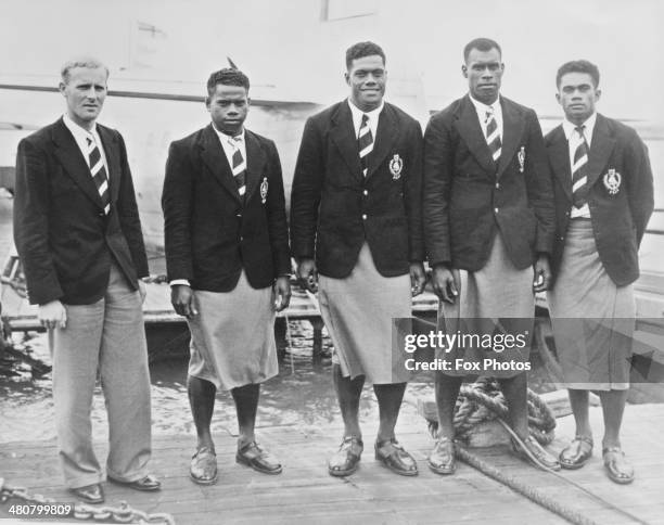 Members of the Fijian team on their arrival in Auckland for the British Empire Games, New Zealand, 19th January 1950. Left to right: manager H.M....