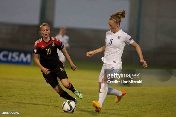 Laura Freigang of Germany challenges Elllie Stewart of England during the UEFA Women's Under-19 European Championship group stage match between U19...