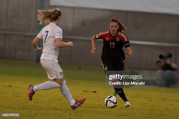 Isabella Hartig of Germany challenges Claudia Walker of England during the UEFA Women's Under-19 European Championship group stage match between U19...