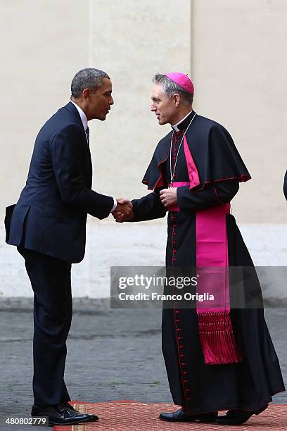 Prefect of the Pontifical House and former personal secretary of Pope Benedict XVI, Georg Ganswein receives US President Barack Obama as he arrives...