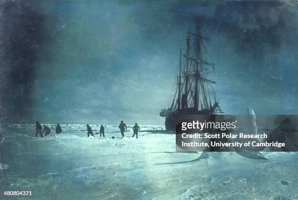 Soccer on the floe whilst waiting for the ice to break up around the 'Endurance' during the Imperial Trans-Antarctic Expedition, 1914-17, led by...