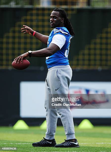 Joique Bell of the Detroit Lions helps to coach a team of local school children during the NFL Launch of the Play 60 scheme at the Black Prince...