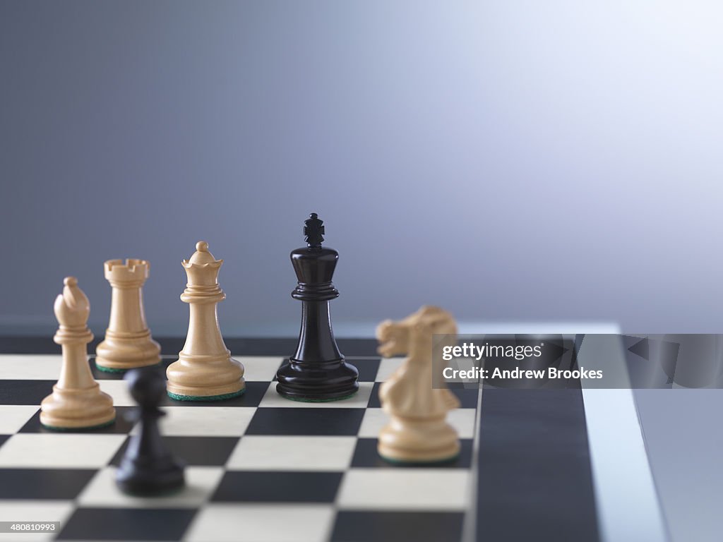 Chess game, player preparing to check mate