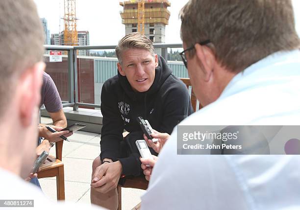 Bastian Schweinsteiger of Manchester United speaks to journalists ahead of a press conference to unveil Bastian Schweinsteiger, Morgan Schneiderlin...