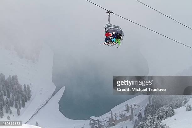 three people on ski lift in kuhtai, austria - kuehtai foto e immagini stock