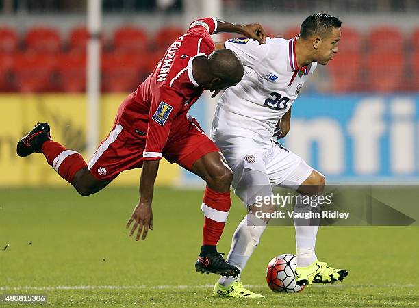 Julian De Guzman of Canada and David Guzman of Costa Rica battle for a header during the 2015 CONCACAF Gold Cup Group B match between Canada and...