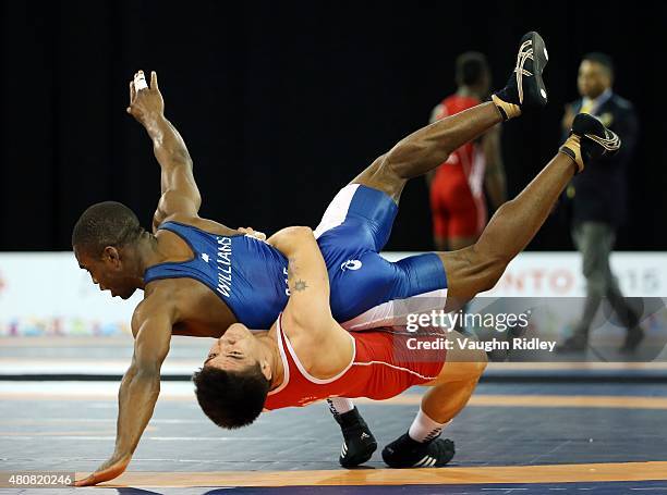 Dylan Williams of Canada and Ali Soto of Mexico compete in the Men's 59kg Greco-Roman Quarterfinal during the Toronto 2015 Pan Am Games at the...