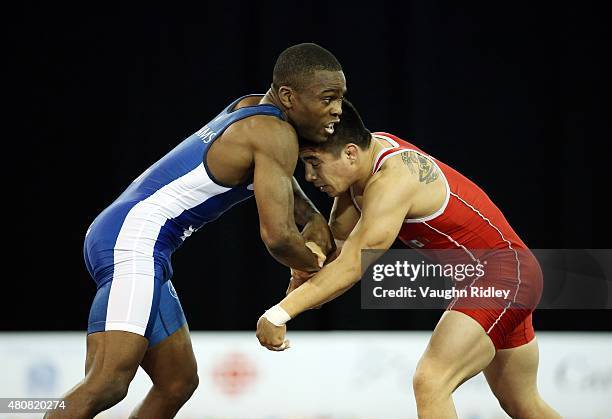 Dylan Williams of Canada and Ali Soto of Mexico compete in the Men's 59kg Greco-Roman Quarterfinal during the Toronto 2015 Pan Am Games at the...