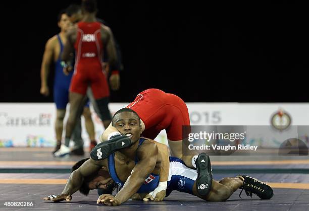 Dylan Williams of Canada and Ali Soto of Mexico compete in the Men's 59kg Greco-Roman Quarterfinal during the Toronto 2015 Pan Am Games at the...