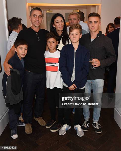 Laurence Dunmore ; Tracy Lowy and family attend The Laslett pre-opening drinks reception at The Laslett on July 15, 2015 in London, England.