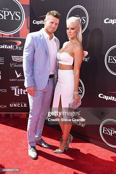 Wrestler The Miz and model Maryse Ouellet attend The 2015 ESPYS at Microsoft Theater on July 15, 2015 in Los Angeles, California.