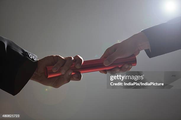 Middle Man Hand Off Business Handoff Photos and Premium High Res Pictures - Getty Images