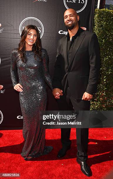 Soccer player Hope Solo with NFL player Jerramy Stevens attends The 2015 ESPYS at Microsoft Theater on July 15, 2015 in Los Angeles, California.