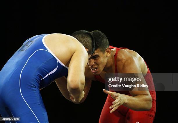 Alfonso Leyva of Mexico and Querys Perez of Venezuela compete in the Men's 85kg Greco-Roman Quarterfinals during the Toronto 2015 Pan Am Games at the...