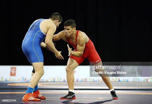 Alfonso Leyva of Mexico and Querys Perez of Venezuela compete in the Men's 85kg Greco-Roman Quarterfinals during the Toronto 2015 Pan Am Games at the...