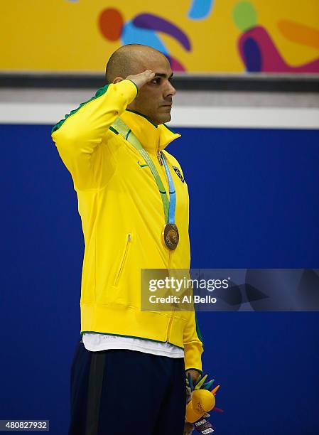 Joao De Lucca of Brazil stands with the gold medal after winning the Mens 200m Freestyle finals at the Pan Am Games on July 15, 2015 in Toronto,...