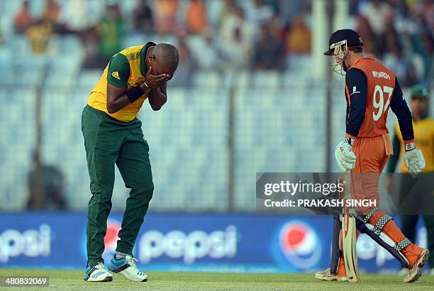 South Africa bowler Lonwabo Tsotsobe reacts after a boundary by Netherlands batsman Stephan Myburgh during the ICC World Twenty20 tournament cricket...