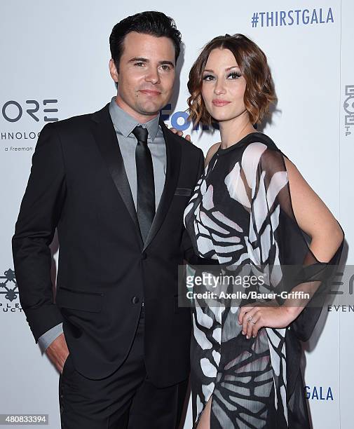 Actors Nathan West and Chyler Leigh arrive at the 6th Annual Thirst Gala at The Beverly Hilton Hotel on June 30, 2015 in Beverly Hills, California.
