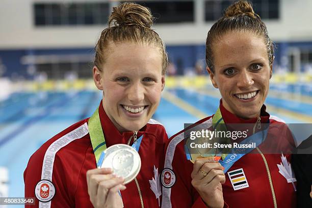 Dominique Bouchard and Hillary Caldwell of Canada finished Silver and Gold in the 200 metres backstroke in the finals of the the second day of the...