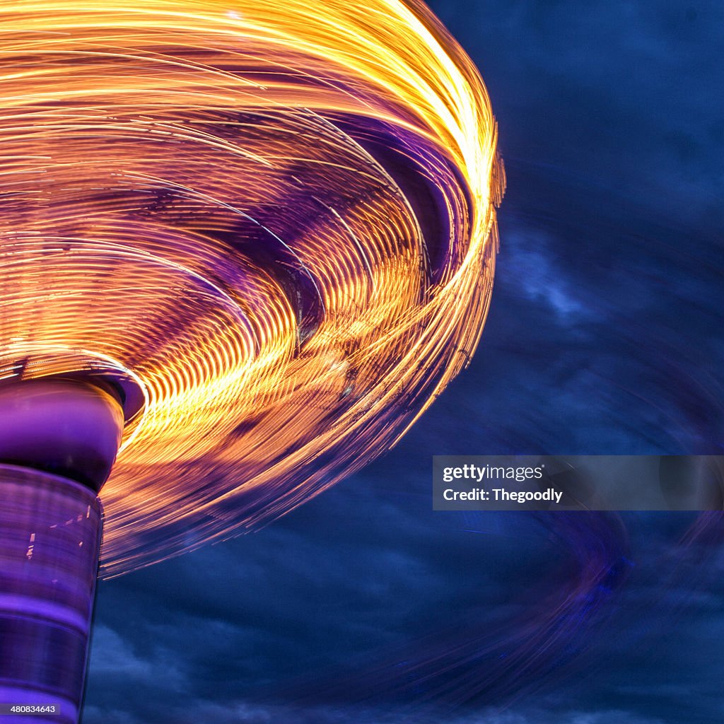 Blurred motion of carousel spinning