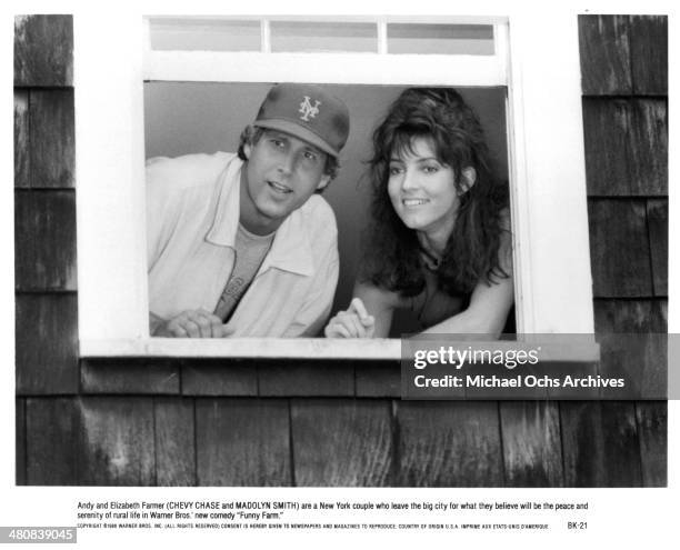 Actor Chevy Chase and actress Madolyn Smith Osborne in a scene from the Warner Bros. Movie "Funny Farm ", circa 1988.