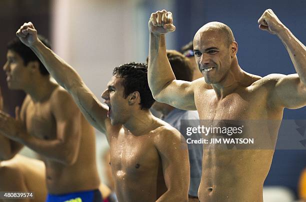 Joao De Lucca and Luiz Melo of Brazil celebate their gold medal victory in the Men's 4X200M Freestyle Relay finals at the 2015 Pan American Games in...