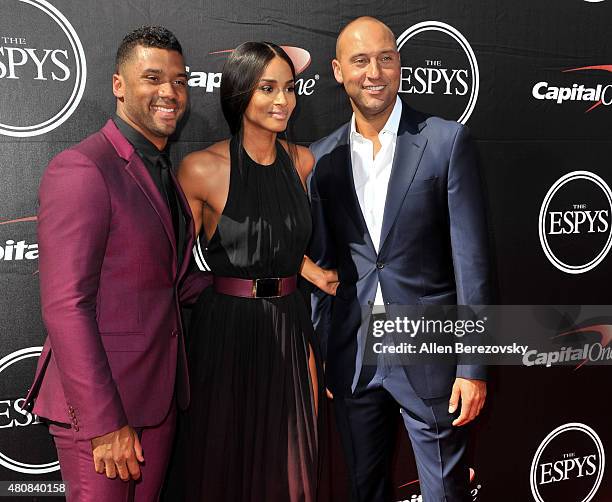 Player Russell Wilson, recording artist Ciara and New York Yankee Derek Jeter arrive at the 2015 ESPYS at Microsoft Theater on July 15, 2015 in Los...