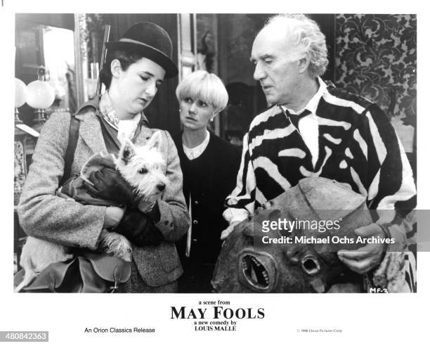Actress Valerie Lemercier, Miou-Miou and actor Michel Piccoli set of the movie " May Fools ", circa 1990.