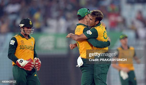 South African bowler Imran Tahir celebrates the wicket of Netherlands batsman Wesley Barresi during the ICC World Twenty20 tournament cricket match...