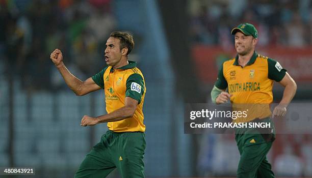 South African bowler Imran Tahir celebrates the wicket of Netherlands batsman Peter Borren during the ICC World Twenty20 tournament cricket match...