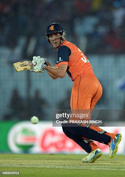 Netherlands batsman Tom Cooper plays a shot during the ICC World Twenty20 tournament cricket match between South Africa and Netherlands at The Zahur...