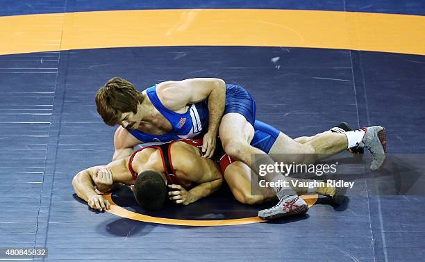 Andrew Bisek of the USA and Alvis Almendra of Panama compete for the Men's 75kg Greco-Roman Gold Medal during the Toronto 2015 Pan Am Games at the...