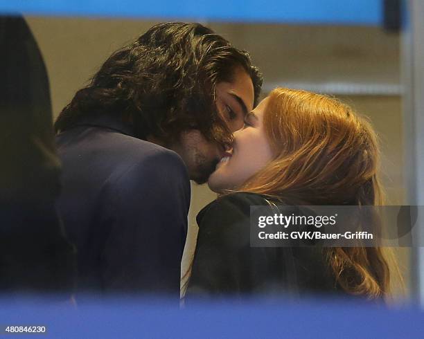 Zoey Dutch and Avan Jogia are seen at LAX. On July 15, 2015 in Los Angeles, California.