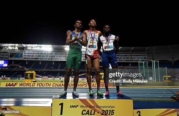 Abdul Hakim Sani Brown of Japan, gold medal, Derick Silva of Brazil, silver medal, and Rechmial Miller of Great Britian, bronze medal, celebrate on...