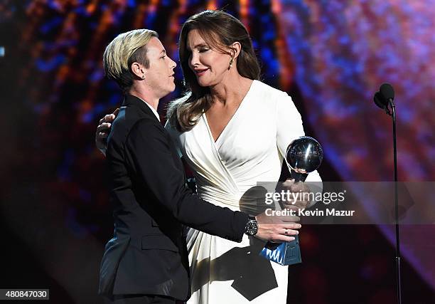 Soccer player Abby Wambach presents Caitlyn Jenner the Arthur Ashe Courage Award onstage during The 2015 ESPYS at Microsoft Theater on July 15, 2015...